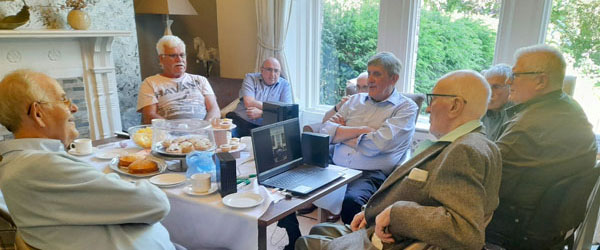 John Walsh watching the video. John Walsh watching the video.