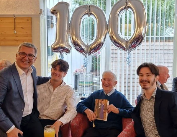 Alex Pratt surrounded by family members with his 100th birthday card from King Charles and Queen Camilla. Alex Pratt surrounded by family members with his 100th birthday card from King Charles and Queen Camilla.