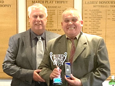 Dave Johnson (left) presenting the Visitors Trophy to Geoff Brown, collecting on behalf of Ron Stott. 