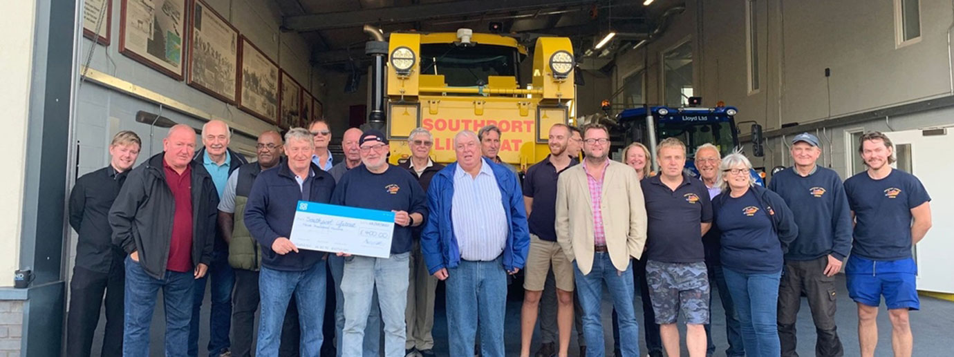Pictured are from left to right, are: James Smith, Steve Kirkbride, Jack Boydell, Trevor Worrell, Paul Howard (presenting the cheque) Neil Lathom, Keith Blackburn, Tom Maher (SORT, receiving the cheque.) Bob Teesdale, Iain Brown, Paul Heaney and Mark Taylor, with members of Southport Lifeboat.