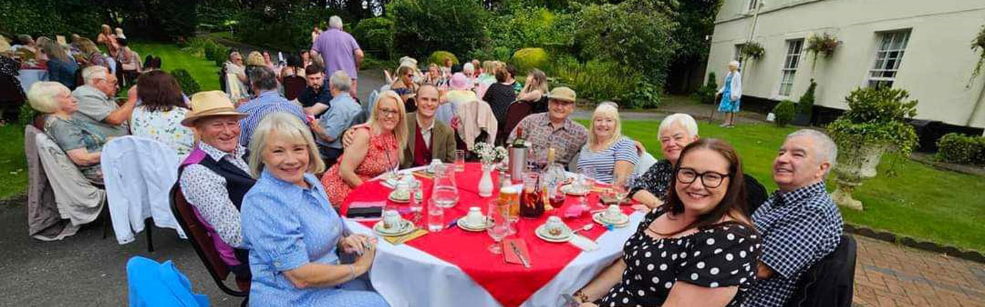 Pictured on the left are Peter and Lesley Allen with guests.