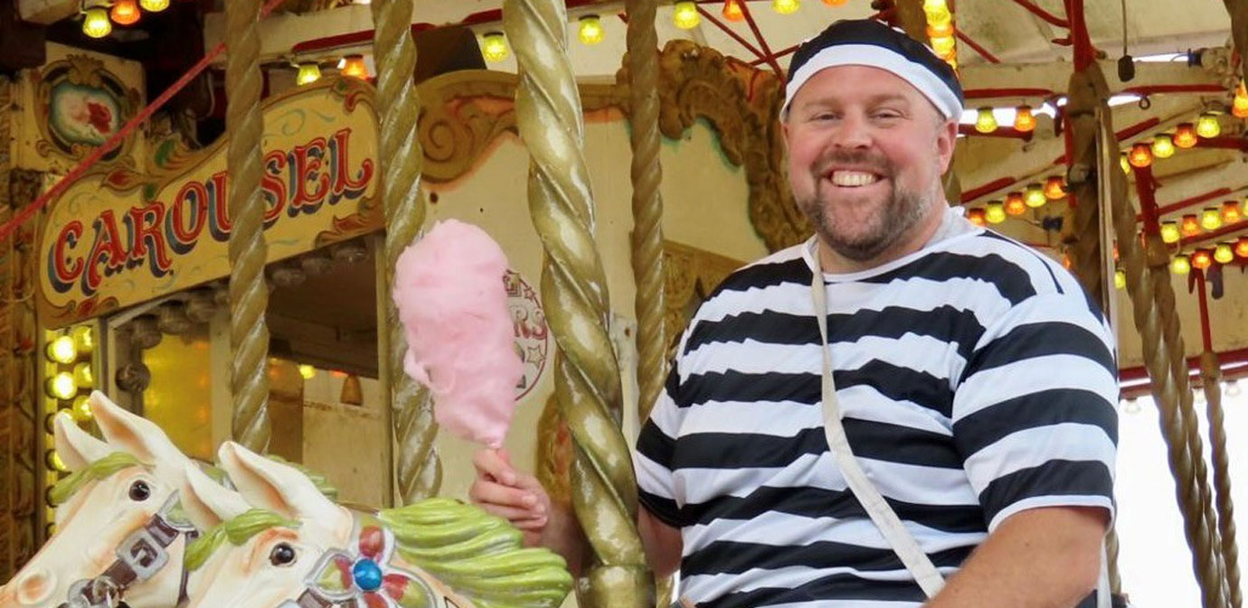 Challenge accepted – eating candy floss while riding a carousel. Challenge accepted – eating candy floss while riding a carousel.