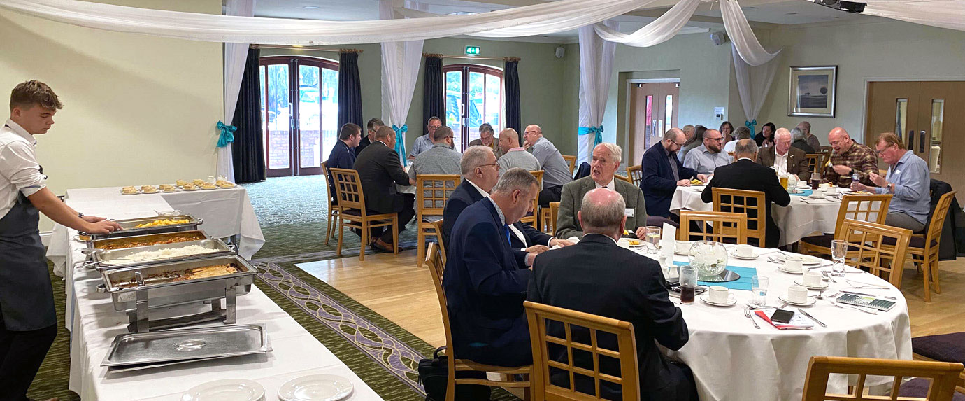 Guests enjoying the hot buffet and desserts.