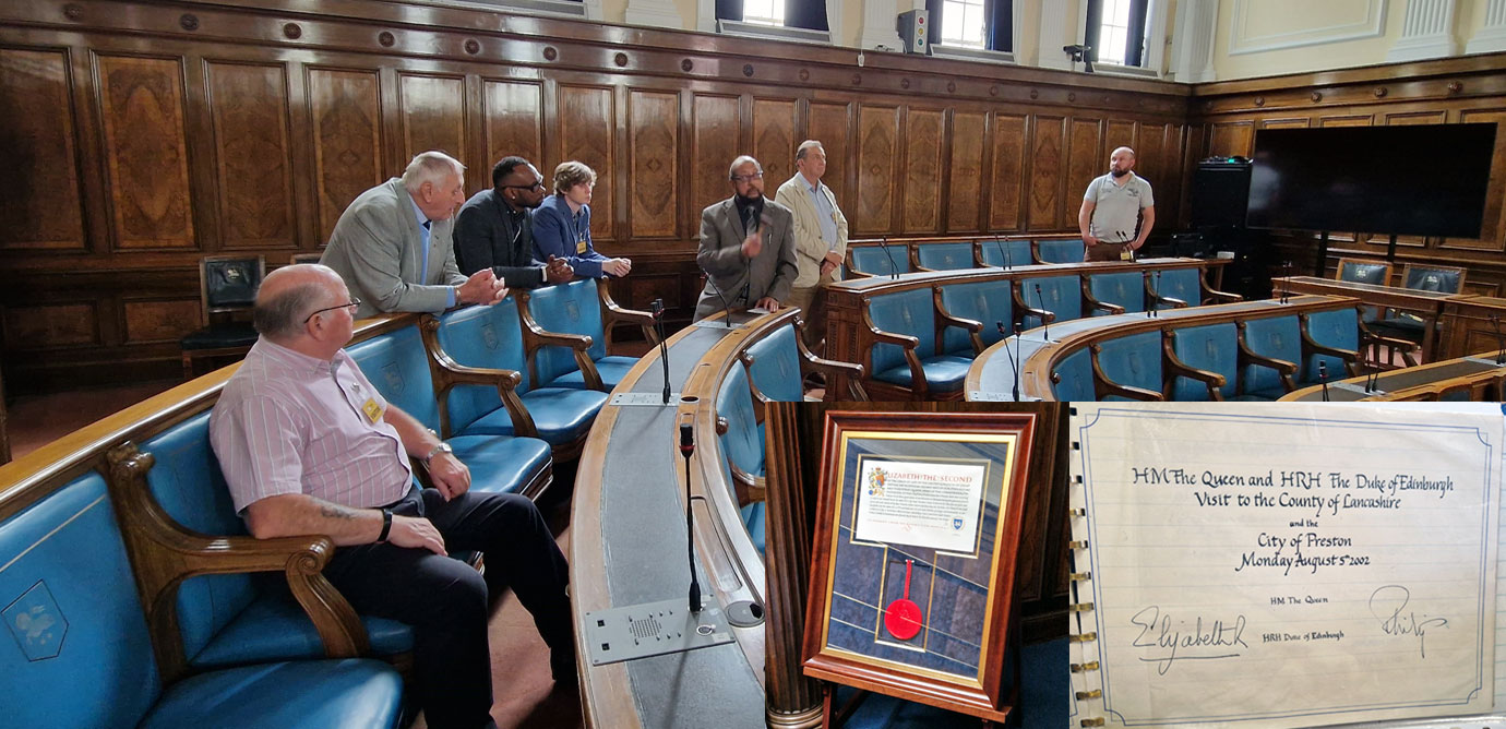Inside the council chamber. Inset: The city seal and the royal visitors’ book.