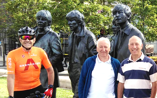 Pictured with the Beatles from left to right, are: Steve Jelly, Stephen Dobson and Charlie Lesniak.