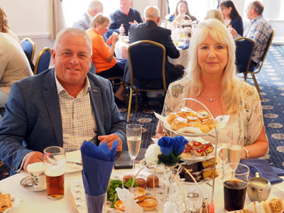 John Topping with his wife Gina, enjoying their meal. John Topping with his wife Gina, enjoying their meal.