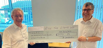 Malcolm Sandywell (left) presenting the cheque to Paul McLachlan. Malcolm Sandywell (left) presenting the cheque to Paul McLachlan.
