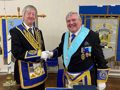 Stephen Gregory (left) with the new master Robert Norris. Stephen Gregory (left) with the new master Robert Norris.