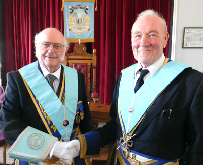 Dave Kellet thanks retiring Hawkshead Lodge director of ceremonies Dennis Batey for his 20 years of outstanding service to the lodge. Dave Kellet thanks retiring Hawkshead Lodge director of ceremonies Dennis Batey for his 20 years of outstanding service to the lodge.