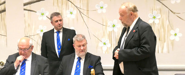 Ian Bloomfield (right) proposes the toast to the WM watched by Robb Fitzsimmons.