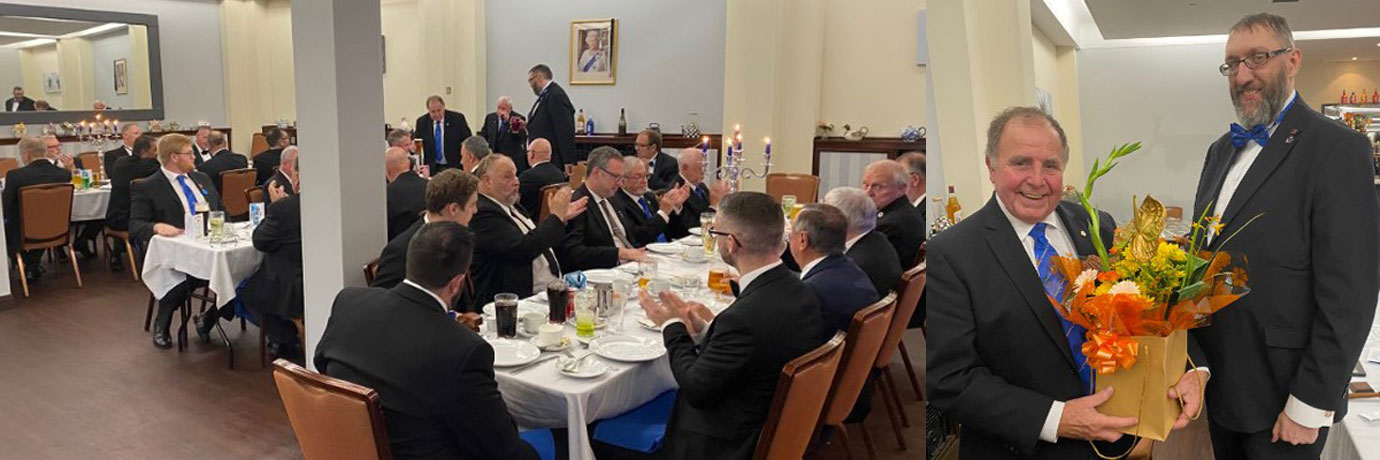 Pictured left: A well-attended festive board. Pictured right: Stuart presenting a gift of flowers to Graham. Pictured left: A well-attended festive board. Pictured right: Stuart presenting a gift of flowers to Graham.