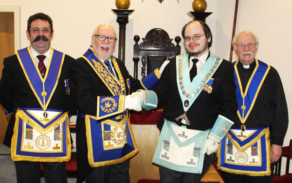 Pictured from left to right, are: Nigel Paton, Mike Adams congratulating Deniol Murphy and Robert Murphy.