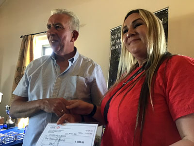 Mark Matthews presenting a cheque to Applebee Wood School. Mark Matthews presenting a cheque to Applebee Wood School.