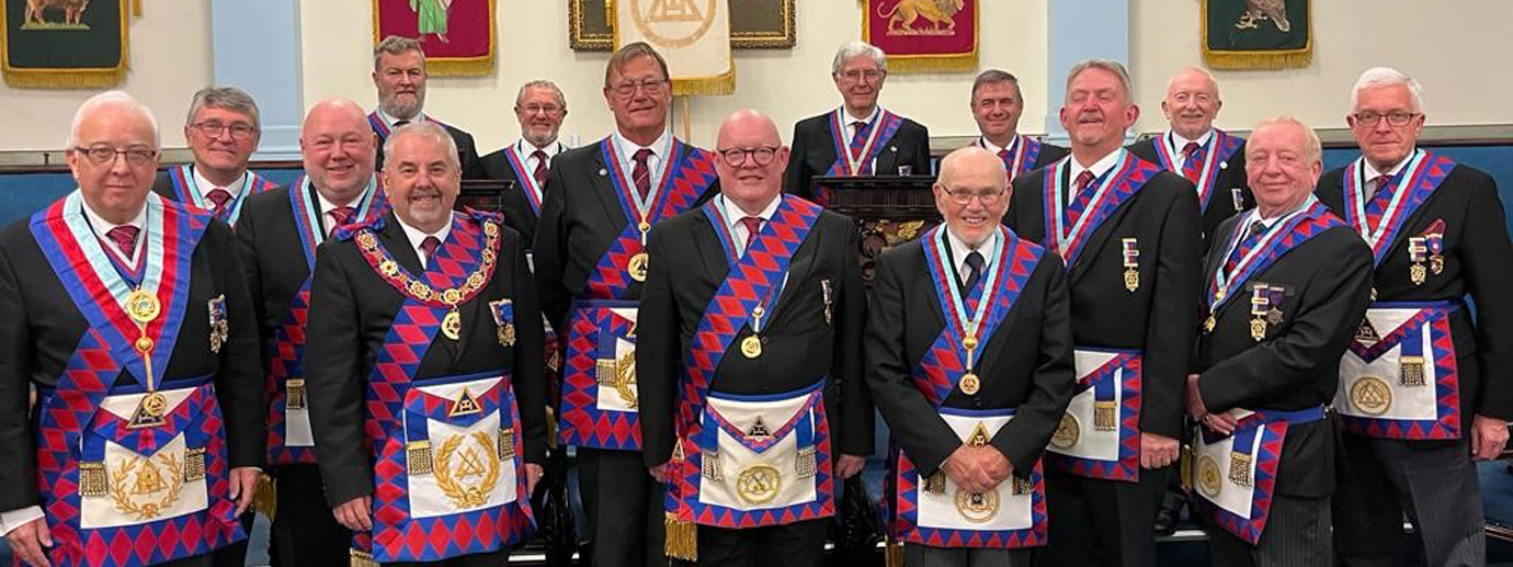 Pictured from left to right Front row, are: Malcolm Alexander, Christopher Butterfield, Neil Latham, Paul Carson, Harry Huyton and Ian Sterling, with the rest of the Provincial Grand Stewards’ team.