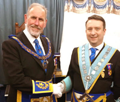 Frank Umbers (left) congratulates Phil Barr.