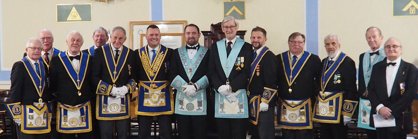 Principal guest John Lee with Dominic Earnshaw (WM) and his Grandfather John Earnshaw with brethren of St John’s Lodge. Principal guest John Lee with Dominic Earnshaw (WM) and his Grandfather John Earnshaw with brethren of St John’s Lodge.