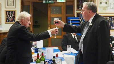 Rob Carey (right) toasts the WM John Wall during the Master’s Song. Rob Carey (right) toasts the WM John Wall during the Master’s Song.