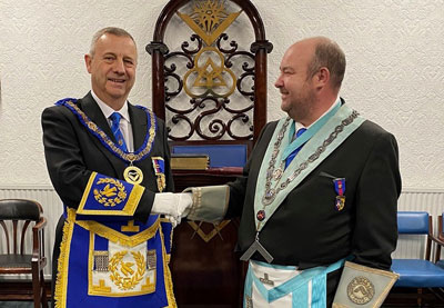 Peter Lockett (left) congratulating Chris Wilson.