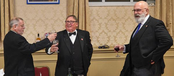 Chris Eyres (left) toasting good health to Glyn, right. Paul Rigby.