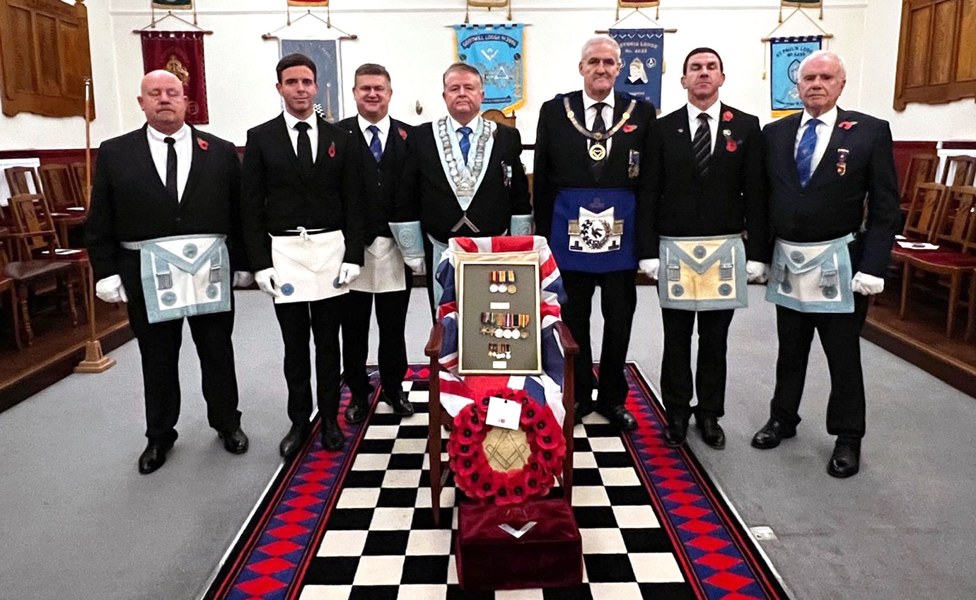 Pictured from left to right, are: Neil Staunton, Scott Gorman and Paul Lawson, Jim Ross, Andrew Whittle, James Battle and John Hutchinson, with the Empty Chair in the foreground.