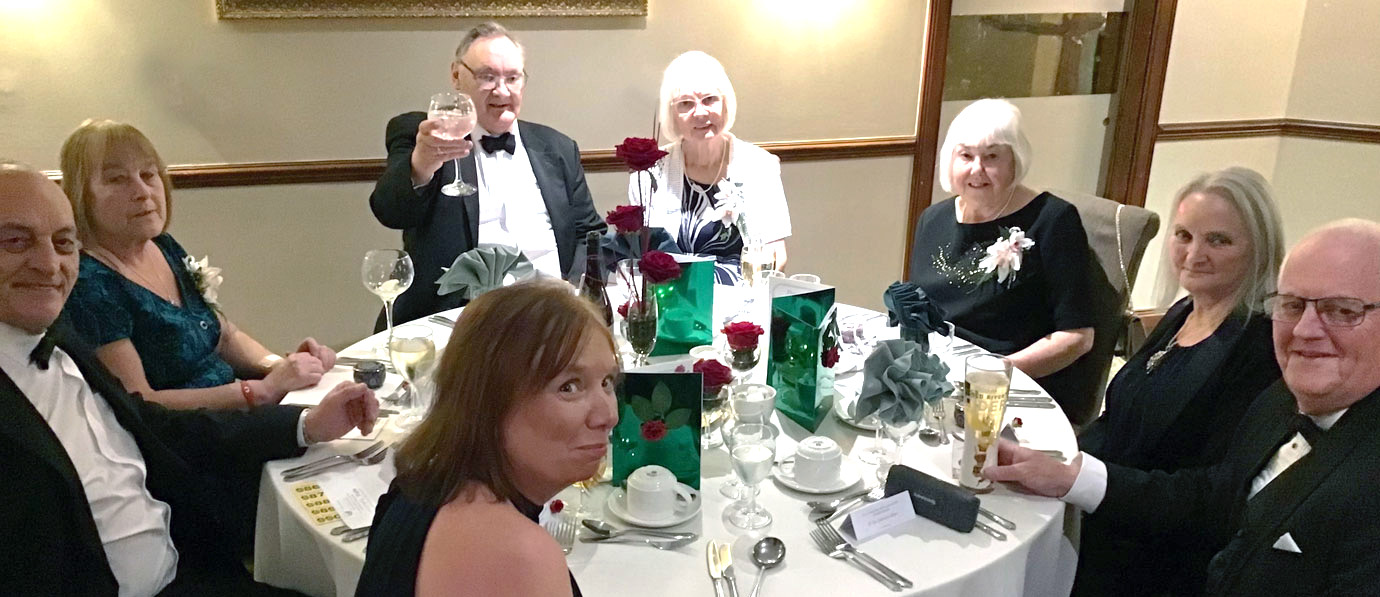 Top table, Mike and June (centre rear) with close friends. 