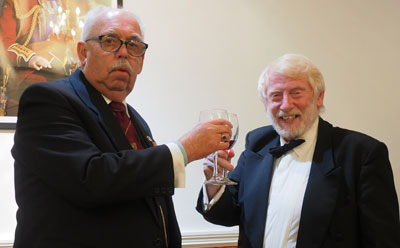 Mike Lumby (left) takes wine with Glenn Priestly. Mike Lumby (left) takes wine with Glenn Priestly.