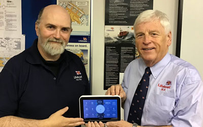 David Devereux (left) of Fleetwood RNLI receiving the Davis Vantage Pro2 control device tablet from David Smith. David Devereux (left) of Fleetwood RNLI receiving the Davis Vantage Pro2 control device tablet from David Smith.