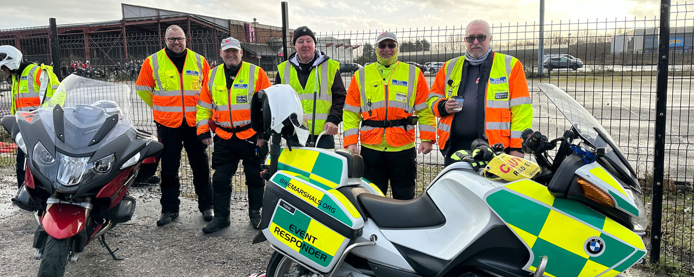 Geoff Bell centre with the bike marshals and blood bikers.