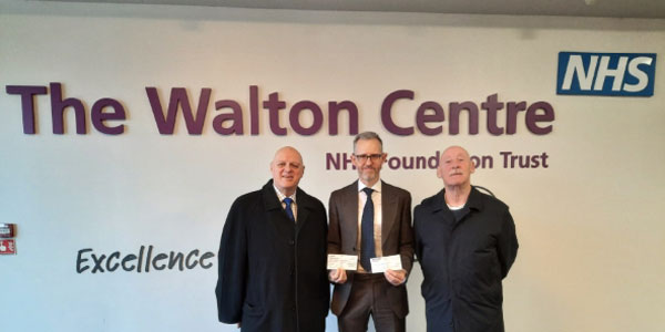 Pictured from left to right, are: David Atkinson, Michael Jenkinson and Jim Corcoran with the cheques being presented.