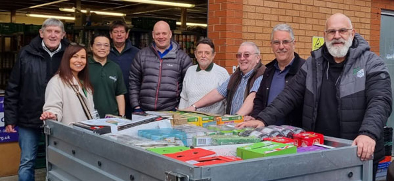 Pictured from left to right, John Tyrer, Vikki O'Donnell, WFB Volunteer, WFB Volunteer, Neil Thomas, WFB Volunteer, Dave Eccles, Andy Barton and Paul Rigby.