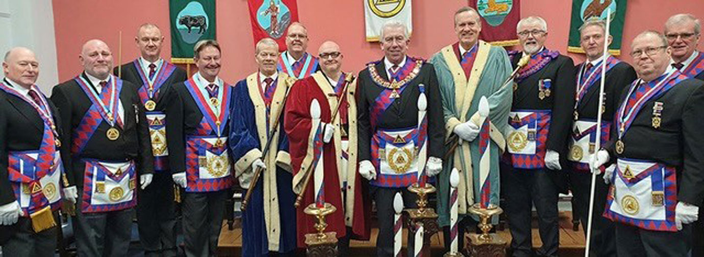 Mark Matthews, centre, flanked by Philip, Alistair and Nigel together with the grand and Provincial grand officers.