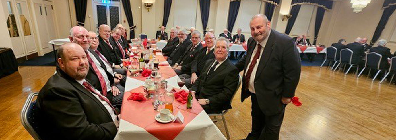 Hesketh Chapter scribe Ezra Neal Atkinson (standing) welcomes the visitors at the festive board.