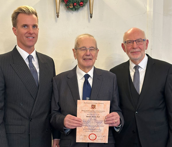Syd receives his certificate. Pictured from left to right, are: Paul Storrar, Syd Ford and John James.