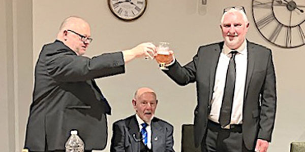Paul Fryer (left) takes wine with Paul Fowler