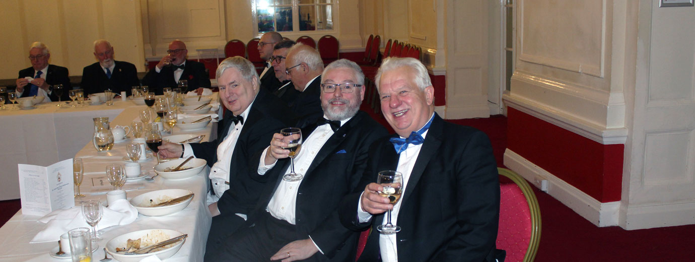 Paul Shirley (right) with David Rigby (centre) enjoying the festive board.