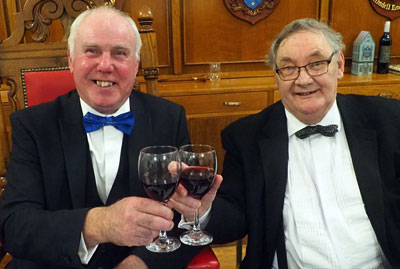Ian Heyes (left) and Mike Casey share a tipple to celebrate a job well done.