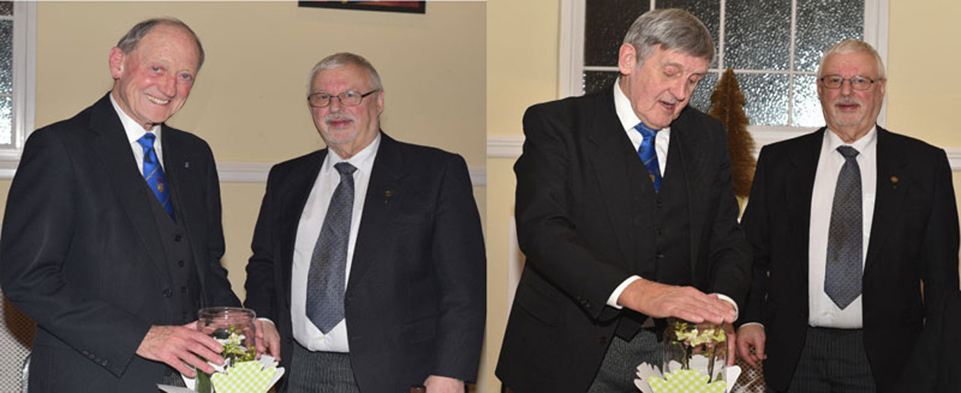 Pictured left: Barry (left) being presented with his orchid by Clive. Pictured right: John (left) being presented with his orchid by Clive.
