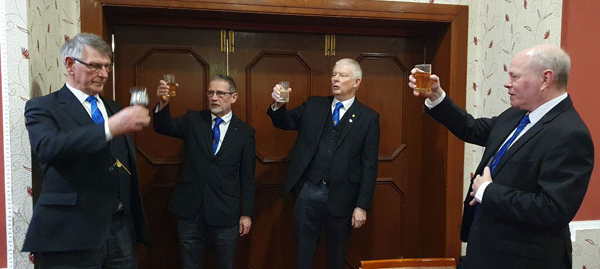 Pictured from left to right, are: David Rowbotham is toasted by Geoff Diggles, Bob Stafford and Duncan Smith.