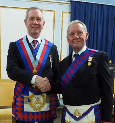 Steven Reid (left) congratulates Mike Hornby on joining the chapter