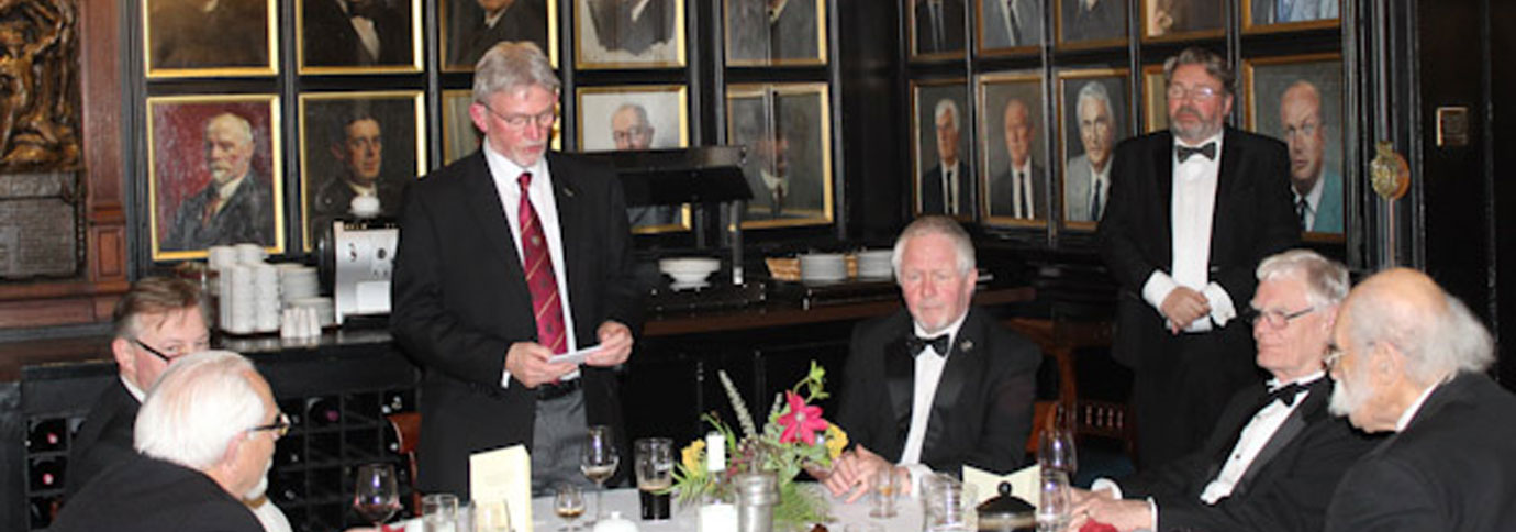 Ian Stirling congratulates the three principals, in the Halliday Room.