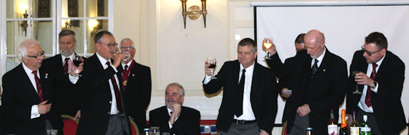 The three principals (right) taking wine with Ian Sanderson and Malcolm Alexander with Chris Butterfield (centre).
