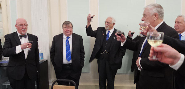 Brethren of Antient Briton Lodge and guests toast the health of the WM.