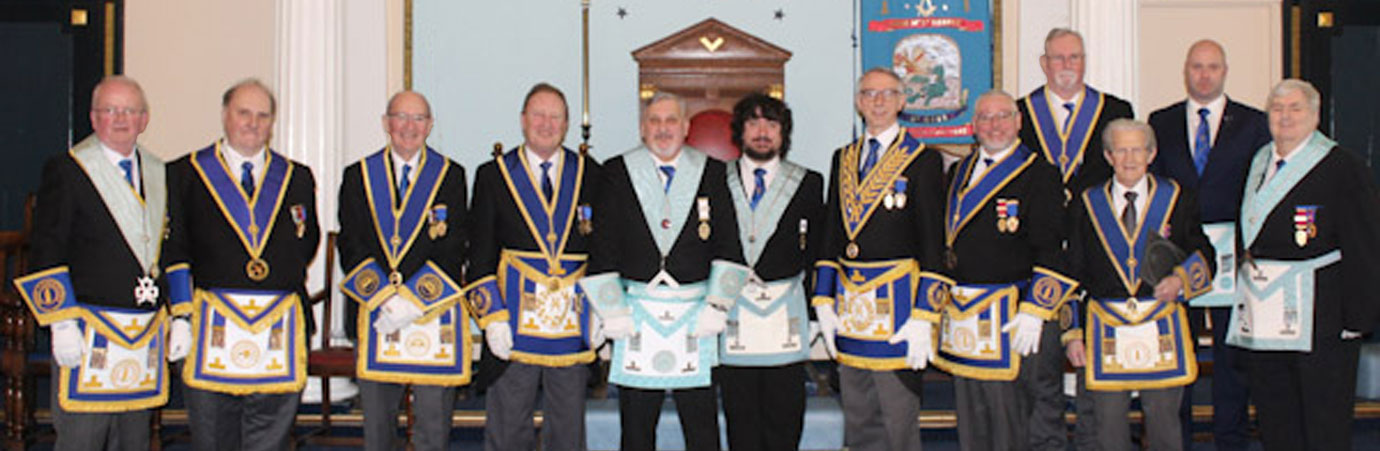 Paul Holden (centre) with guests and brethren.