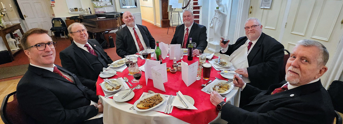 Companions enjoying their meal after a splendid installation.