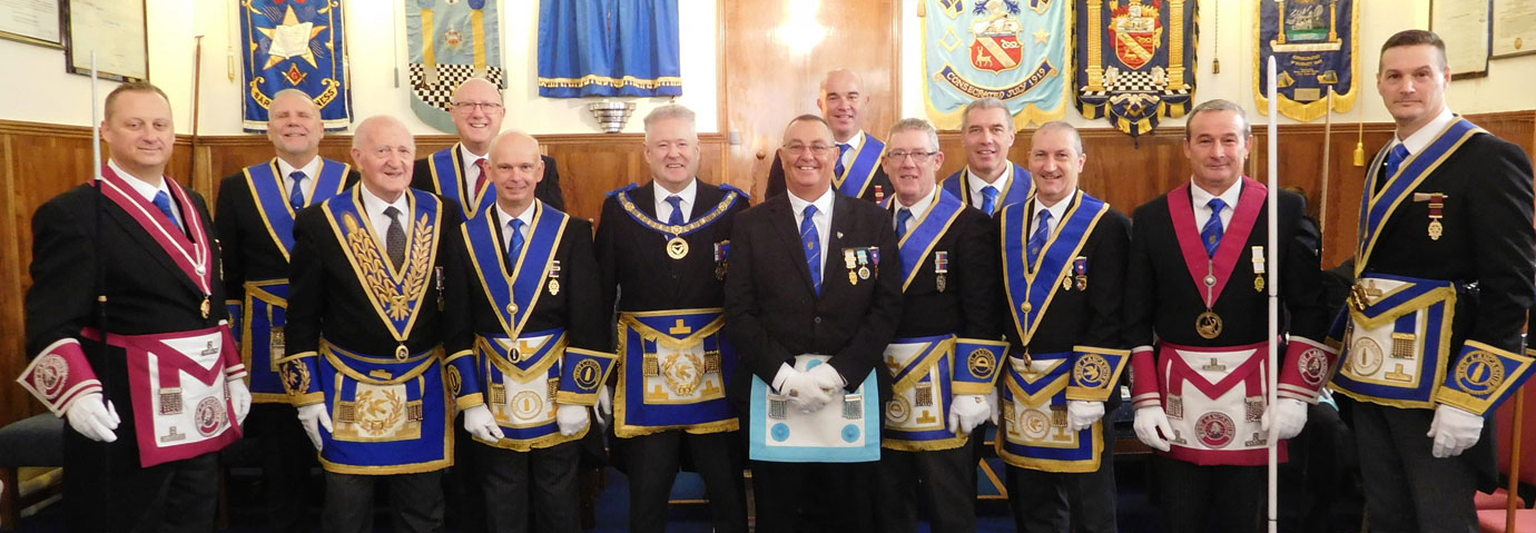 Acting Provincial grand officers, grand officers, and group executive join Allan Whittaker. Acting Provincial grand officers, grand officers, and group executive join Allan Whittaker.