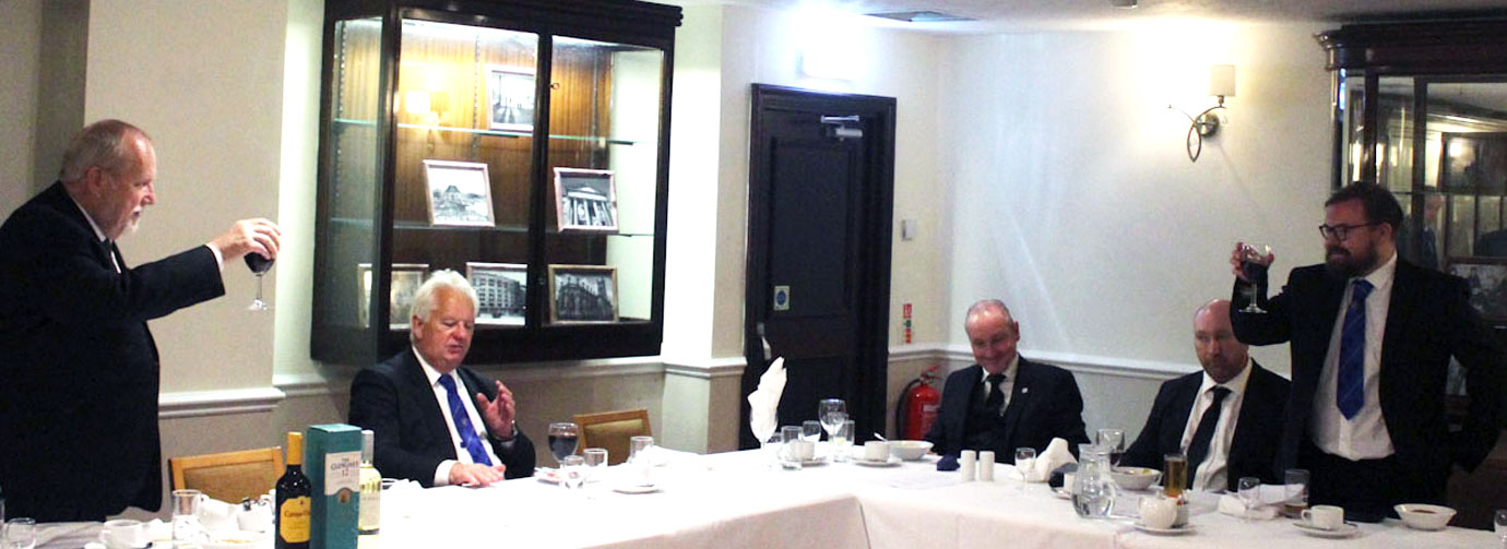 Tom Smith (left) toasts Joe Lynch. Tom Smith (left) toasts Joe Lynch.