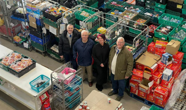 Pictured from left to right, are: Steve Jelly, Colin Goodwin, Victoria Blakeman and Neil Higgins in the food bank warehouse. Pictured from left to right, are: Steve Jelly, Colin Goodwin, Victoria Blakeman and Neil Higgins in the food bank warehouse.