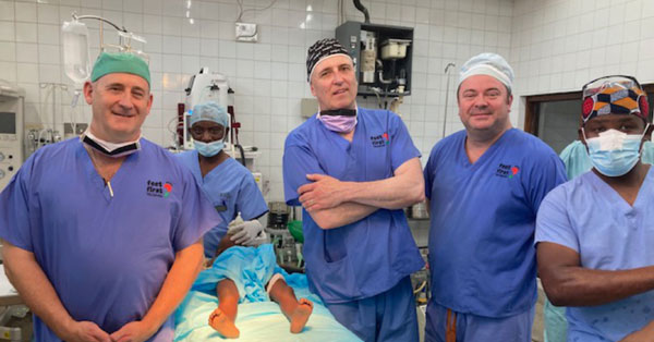 Pictured from left to right, are: Steve Mannion, Clive Chenery, Alan Monks and the theatre nurses. Pictured from left to right, are: Steve Mannion, Clive Chenery, Alan Monks and the theatre nurses.