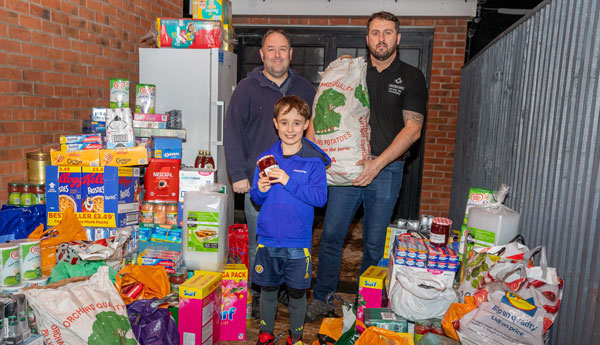 Pictured from left to right, are: Ben Gorry, Arran Gorry and David Jenkinson storing the supplies in the secure lockup Pictured from left to right, are: Ben Gorry, Arran Gorry and David Jenkinson storing the supplies in the secure lockup