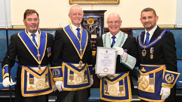 Pictured from left to right, are: Greg Pinnington, Phil Stock, Arthur Waine proudly holding his jubilee certificate and David Thomas Pictured from left to right, are: Greg Pinnington, Phil Stock, Arthur Waine proudly holding his jubilee certificate and David Thomas